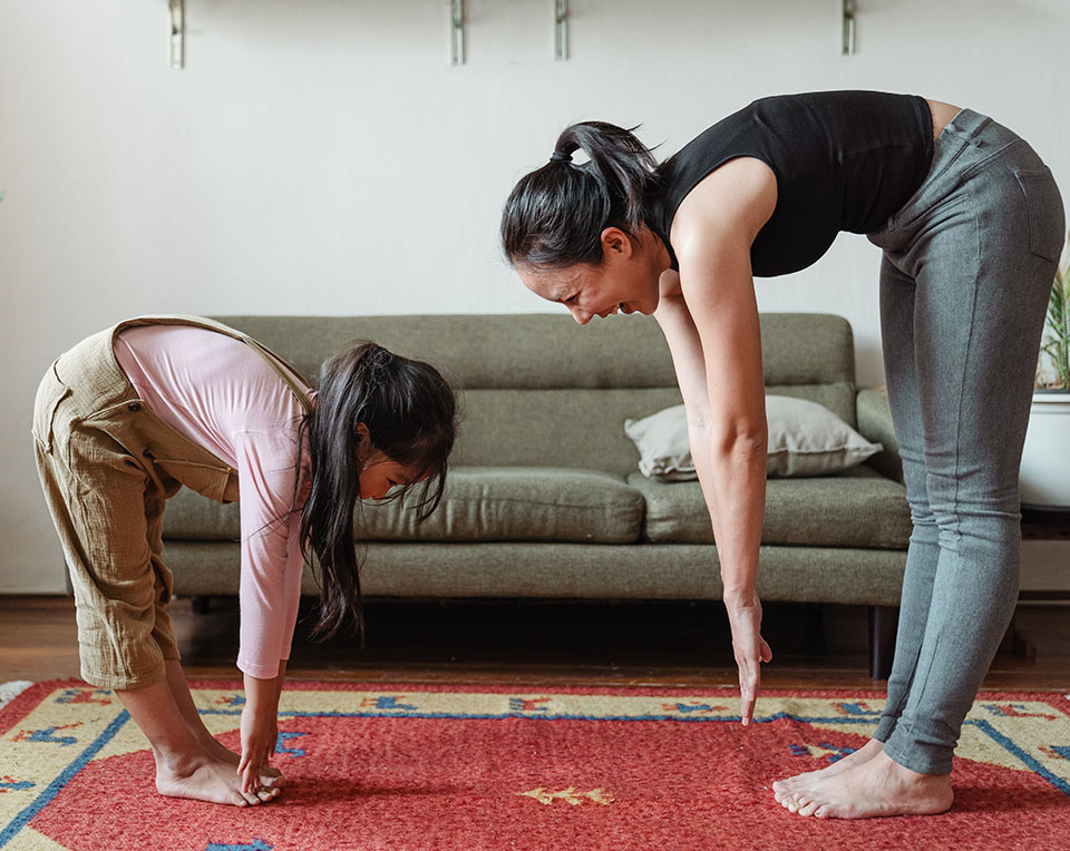 mom and daughter exercising